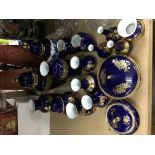 A large collection of blue and gold decorated Roya