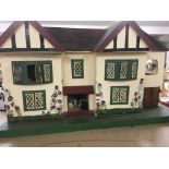 A doll's house and a collection of conforming furn