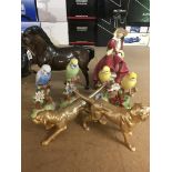 A pair of gilt metal figures in the form of gun dogs four Staffordshire bird Doulton figure and a