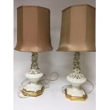 Two white glazed ceramic lamps encrusted with rais