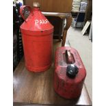 Vintage one gallon petrol can and a red paraffin c