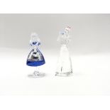 A Swarovski Alice in wonderland figure and a Snow