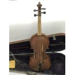 A Barnes & Mullins Amati model number 54 violin in need of restoration, comes supplied with a bow