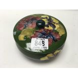 A Moorcroft pottery Hibiscus pattern powder bowl.