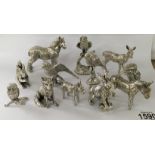 A collection of white metal animal figures (12).