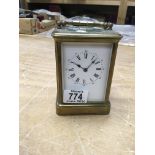 A brass cased carriage clock. Seems to be working.