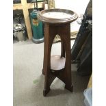 An Arts & Crafts mahogany plant stand, approx heig