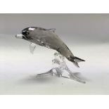 A Swarovski figurine of a Dolphin approx 8 cm in h