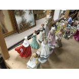 8 porcelain lady figures including Royal Doulton.