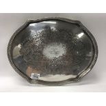 A large silver plated tray with gallery with engra