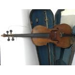 A late 19th / early 20th Century French violin labelled JTL supplied with bow and case.