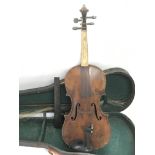 A Wolf Brothers violin dated 1888 in need of restoration, comes supplied with a bow and case.