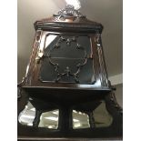 A Edwardian mahogany corner cabinet with glazed do