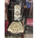 A Victorian walnut chair with barley twist supports and cabriole legs.