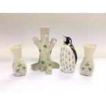 Three items of Belleek comprising a spill vase and