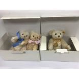 Three modern Steiff bears and two boxes.