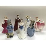 Seven ceramic figures comprising Doulton, Worceste