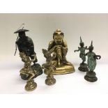 A collection of Oriental figures comprising a bron