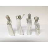 Four Lladro figures in the form of ladies in a nig