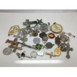 A collection of approx 40 religious pendants and c