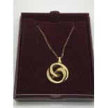 A 9ct gold modern style pendant on chain.