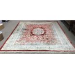 A large Chinese silk carpet 360 x 287cm