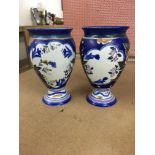A pair of Carltonware vases decorated with flowers