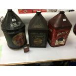 Included are 3 large oil cans and a smaller oil ca