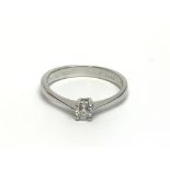 An 18ct white gold solitaire diamond ring, approx.