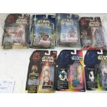 A collection of carded Star Wars figures including