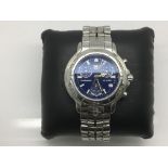 A boxed gents Tag Heuer chronograph watch with blu