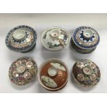 A collection of Oriental tea bowls.
