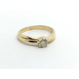 An 18ct gold solitaire diamond ring, approx 1/4ct,