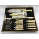 A cased silver plated cutlery set.