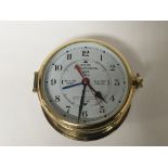 A brass cased Ships type clock maker Schatz West G