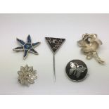 Five silver brooches including a pique butterfly d