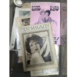 A collection of items relating to the actress Clara Bow including an autograph, posters, newspaper