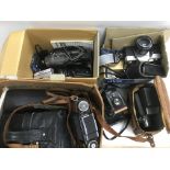 A collection of cameras and photographic equipment