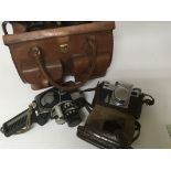 A Vintage leather camera bag a Zeiss Ikon camera C