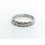 An 18ct white gold five stone diamond ring, approx