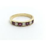 An 18ct gold half eternity ring set with alternati