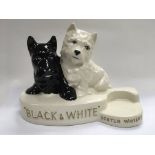 A Crown Devon Black & White scotch whisky ornament