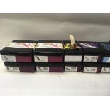 Included is an assortment of 18 boxed model shoes.