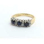 An 18ct gold sapphire and diamond ring, approx 3.1