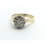 An 18ct gold diamond cluster ring, approx 4.2g and