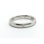 An 18ct white gold six stone diamond ring, approx.