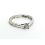 An 18ct white gold solitaire diamond ring, approx