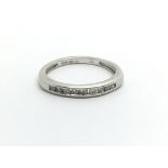 A platinum half eternity diamond ring, approx 2.3g