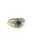 A 9ct gold sapphire and diamond cluster ring, appr