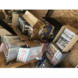 Ten boxes of DVDs comprising many films and TV ser